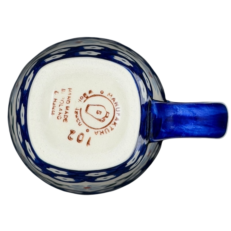 Bottom view of Polish Pottery Tapered Floral Boleslawiec Mug showcasing intricate craftsmanship and design