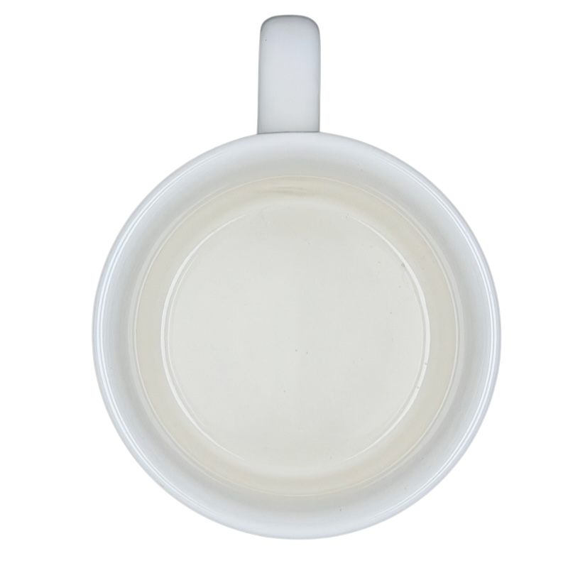 Top view of Airstream Happy Camper Mug Pottery Barn showing a sleek white interior for coffee lovers
