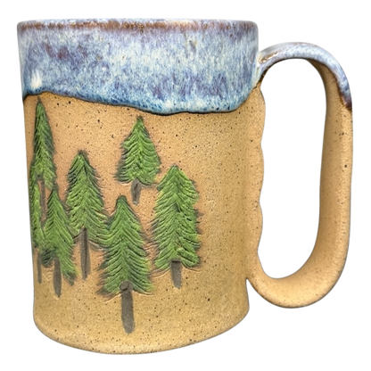 MSM Creations Pine Tree Rustic Drip Glaze Pottery Mug with a textured forest design