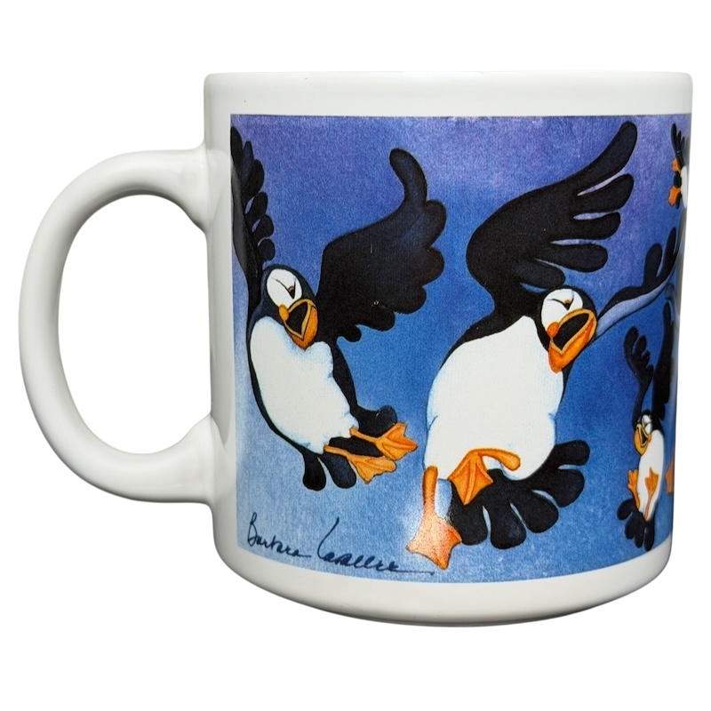Puffins Barbara Lavallee Mug Arctic Circle Enterprises featuring colorful puffins on a blue background