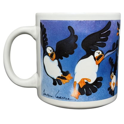 Puffins Barbara Lavallee Mug Arctic Circle Enterprises featuring colorful puffins on a blue background