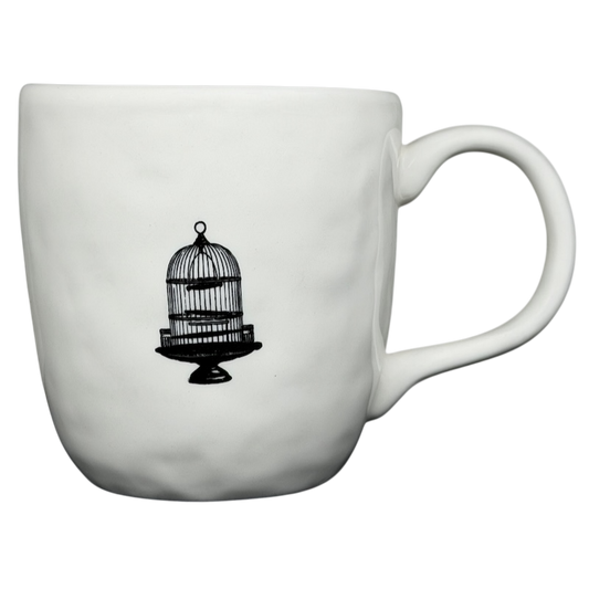 Rae Dunn birdcage mug featuring a simple black birdcage design on a white ceramic surface
