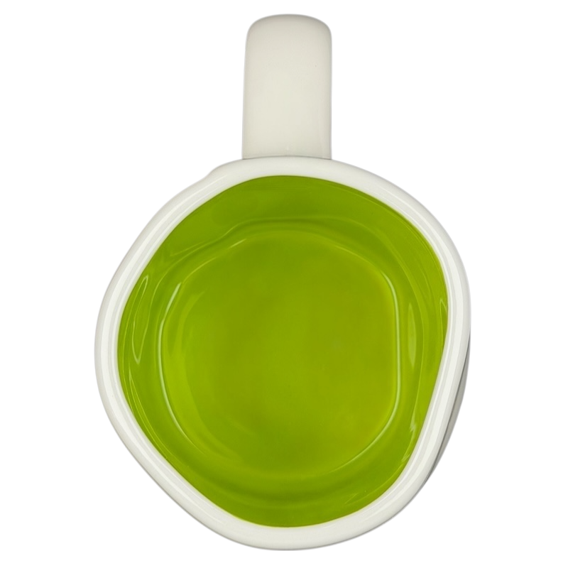 Rae Dunn Buzz Lightyear Pixar Disney mug with a vibrant green interior design