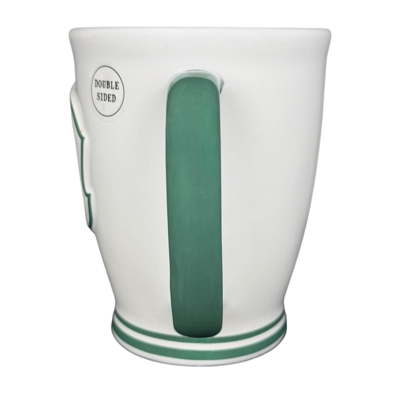 Rae Dunn Harry Potter Slytherin mug featuring a green handle and double-sided design