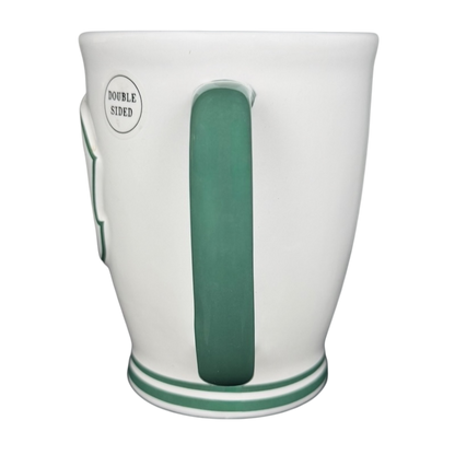 Rae Dunn Harry Potter Slytherin mug featuring a green handle and double-sided design