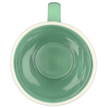 Top view of the Rae Dunn Harry Potter Slytherin mug showcasing its green interior and simple design