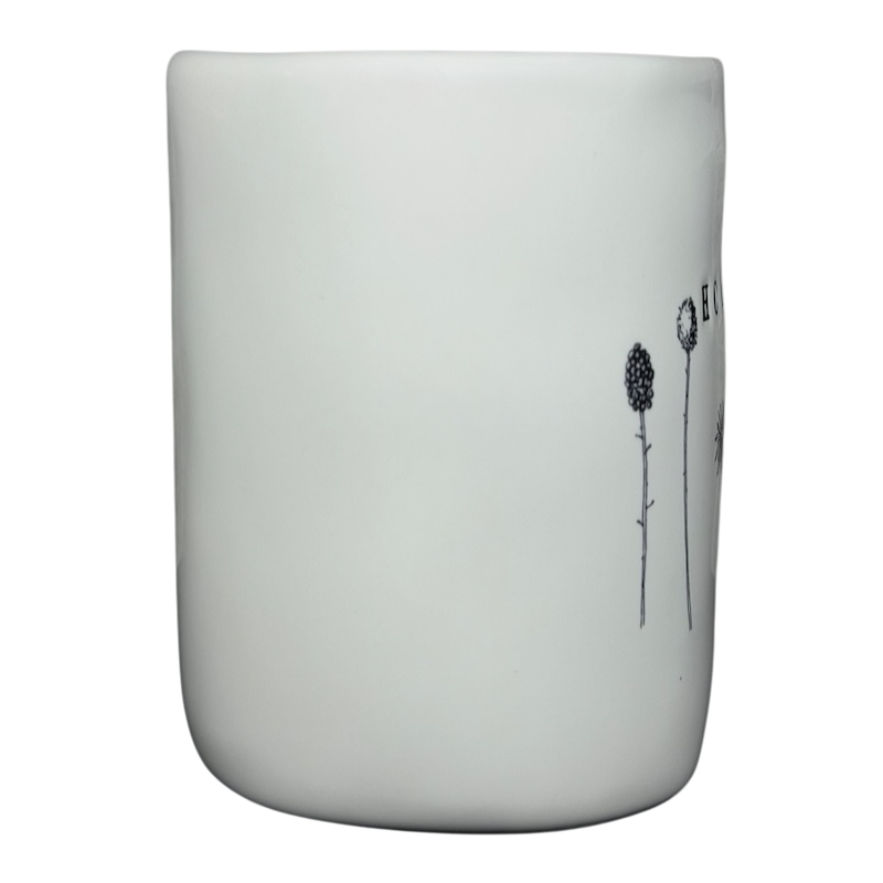Rae Dunn Magenta HOME wildflowers mug featuring delicate wildflower illustrations on a white ceramic surface