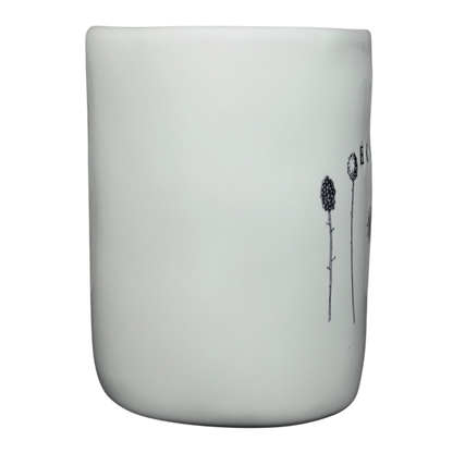 Rae Dunn Magenta HOME wildflowers mug featuring delicate wildflower illustrations on a white ceramic surface