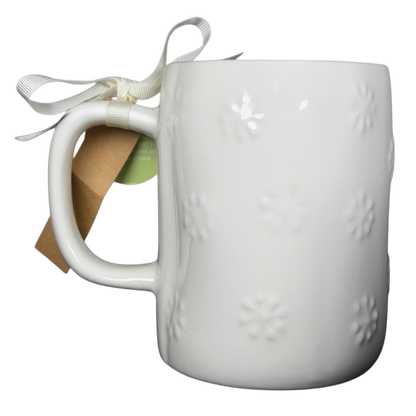 Rae Dunn Merry and Bright collectible mug with embossed floral pattern and ribbon detail