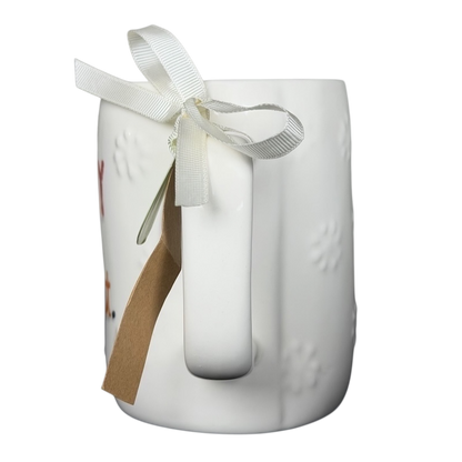 Rae Dunn Merry and Bright collectible mug with embossed design and decorative ribbon detail