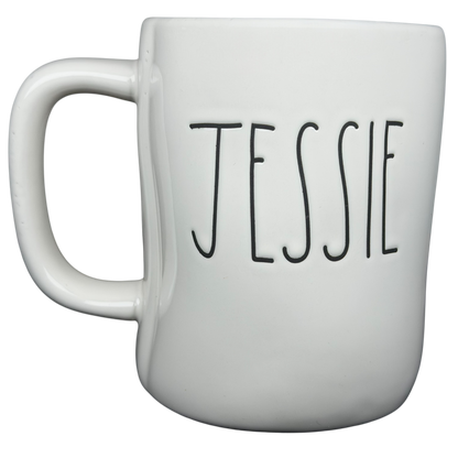 Rae Dunn Toy Story Jessie Disney Pixar mug in white ceramic with bold letters