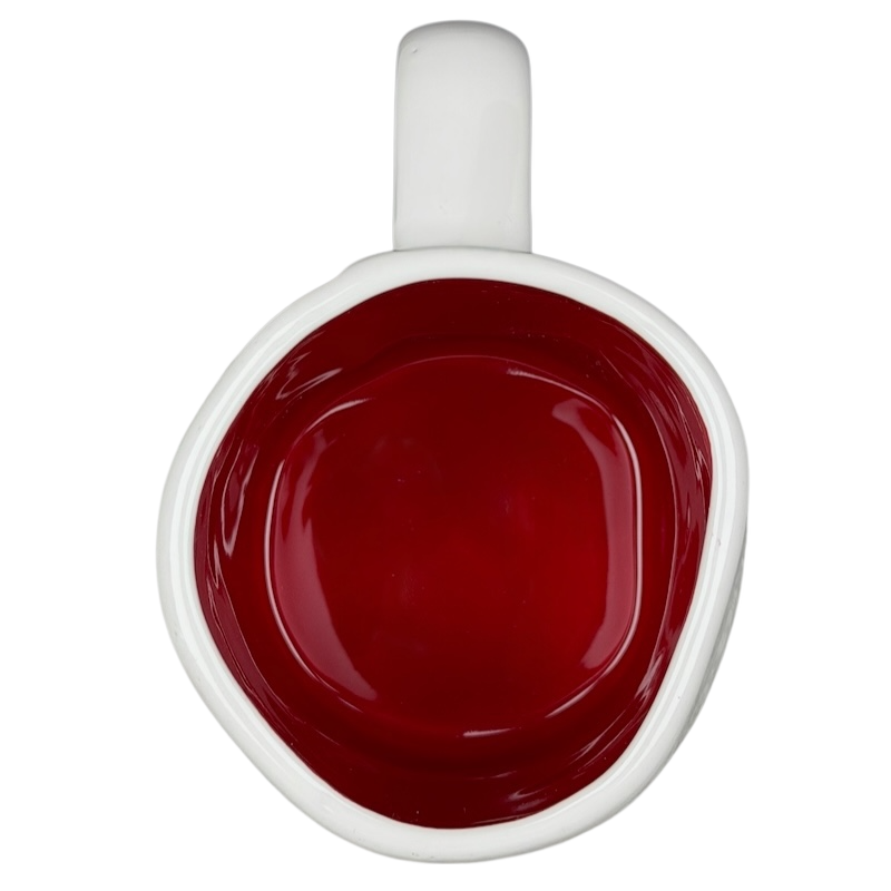 Rae Dunn Toy Story Jessie Disney Pixar mug featuring a vibrant red interior and unique shape