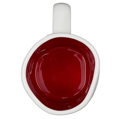 Rae Dunn Toy Story Jessie Disney Pixar mug featuring a vibrant red interior and unique shape