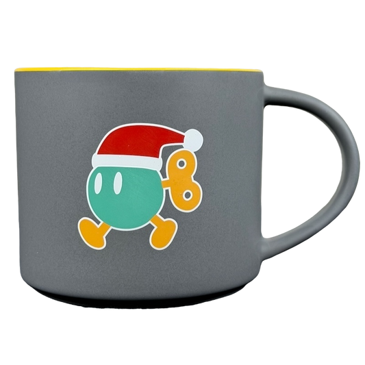 Copco rare Redmond Nintendo mug featuring a festive character design with a Santa hat