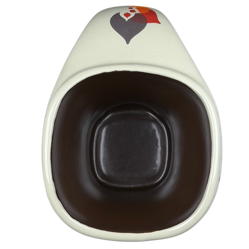 Top view of Reflect By Patricia Ryan Miam Miam Mug showcasing its unique design and smooth interior