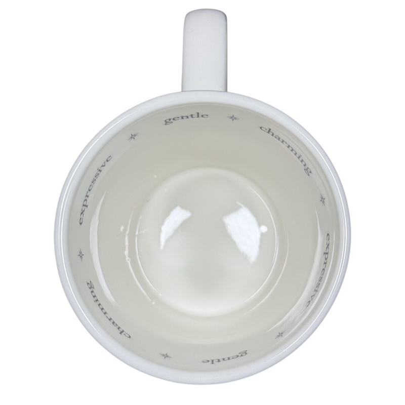 Inside view of Rory Dobner astrology mug featuring charming and gentle design elements