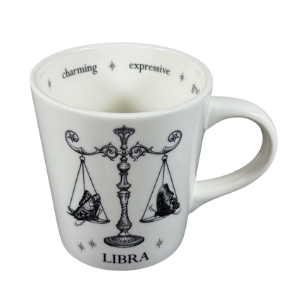 Williams-Sonoma Rory Dobner astrology mug featuring Libra scales design in black and white