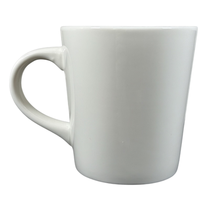 Plain white ceramic Rory Dobner astrology mug with a large handle on a black background