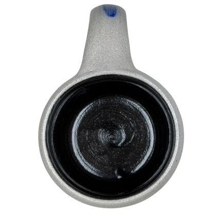 Inside view of God Bless America salt glazed Rowe Pottery mug with a smooth black finish