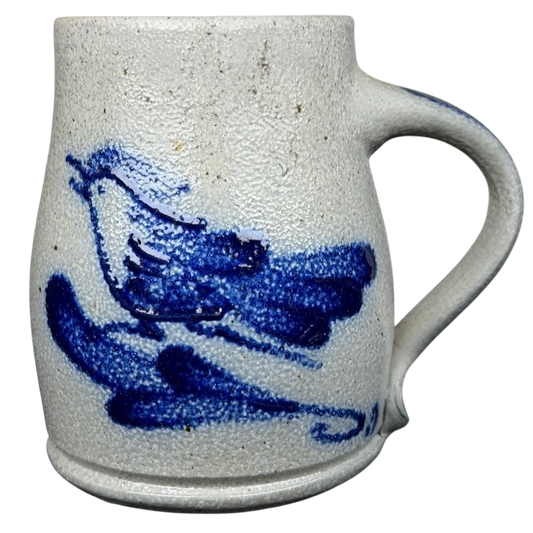 Rowe Pottery Works blue bird mug with textured surface and hand-painted bird design