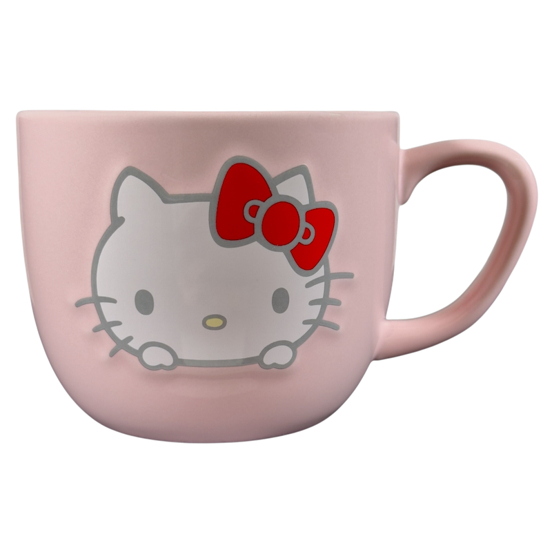 Hello Kitty collectible Sanrio mug in pink with a cute bow design, perfect for fans and collectors