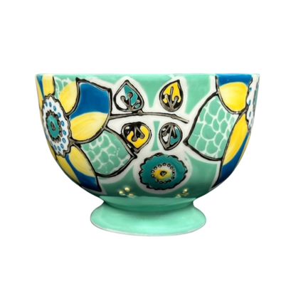 Anthropologie Elka Ayaka green floral pedestal mug hand painted ceramic footed cup with blue and yellow flowers