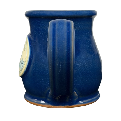 Simply Divine Bed and Breakfast Deneen mug in deep blue with a curved handle and classic design