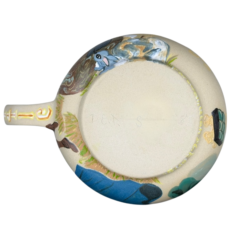 Sleeping Beauty hand-painted pottery mug featuring intricate designs and vibrant colors