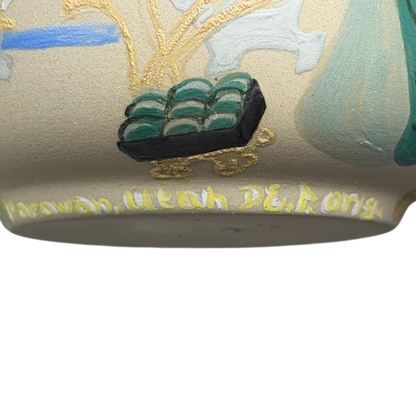 Sleeping Beauty hand-painted pottery mug featuring intricate floral designs and vibrant colors