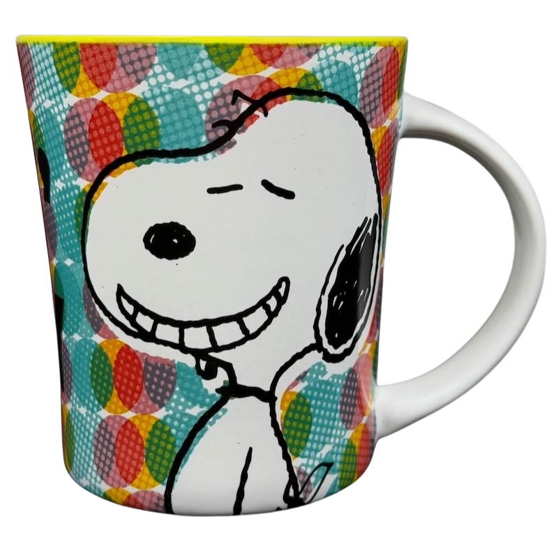 Gibson Snoopy Peanuts Feelin' Groovy mug with colorful patterned design and smiling Snoopy illustration
