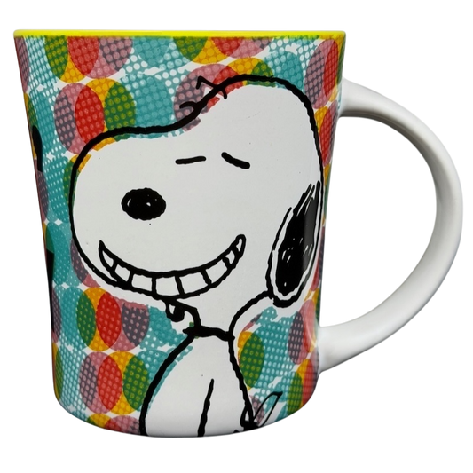 Gibson Snoopy Peanuts Feelin' Groovy mug with colorful patterned design and smiling Snoopy illustration