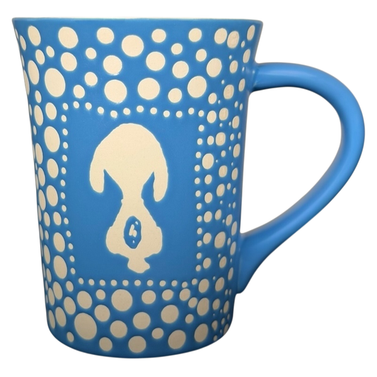 Blue mug featuring a Snoopy silhouette polka dot design for coffee or tea lovers