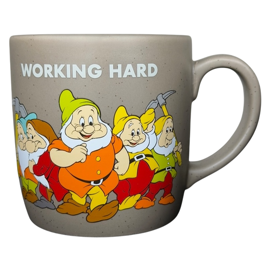 Disney Snow White and the Seven Dwarfs working hard collectible mug featuring cheerful dwarfs in colorful outfits