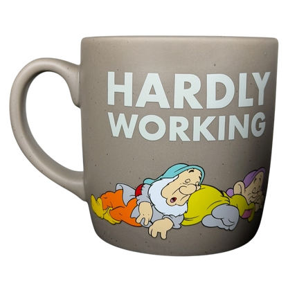 Disney Snow White and the Seven Dwarfs working hard collectible mug featuring dwarfs in a playful design