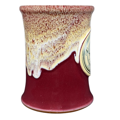 Southmoreland On The Plaza Deneen mug featuring a unique glaze design in burgundy and cream colors