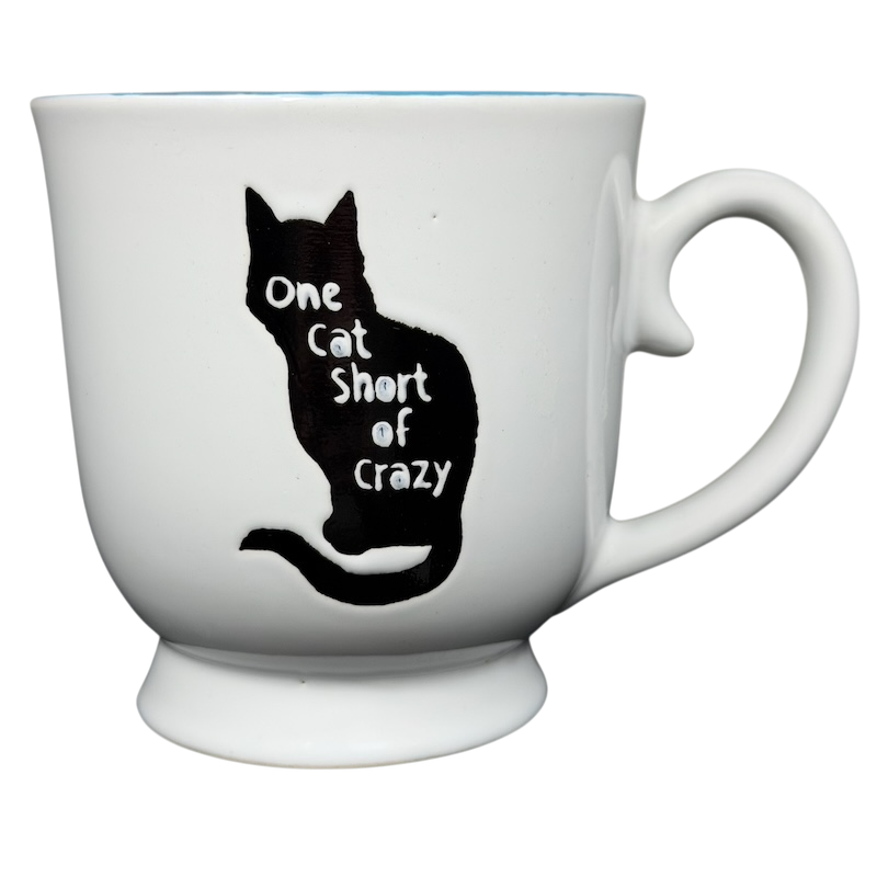 One Cat Short Of Crazy Mug Spectrum Designz featuring a black cat silhouette on a white ceramic cup