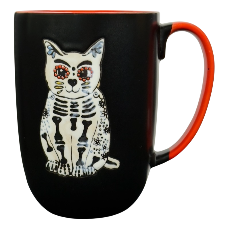 Spectrum Designz Day of the Dead cat mug black ceramic with orange interior and handle and white sugar skull cat design