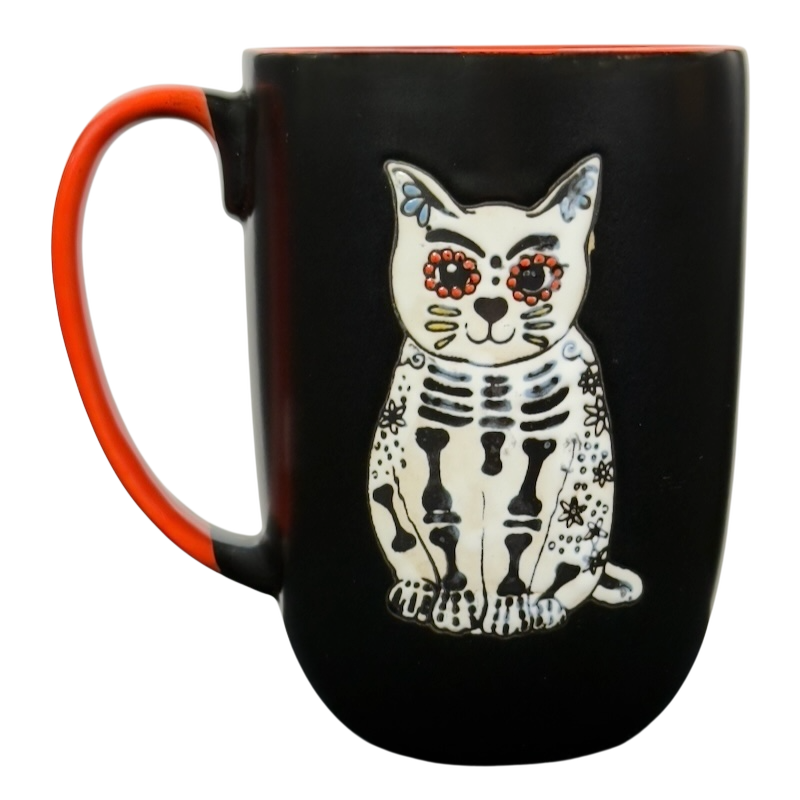 Spectrum Designz Day of the Dead cat mug black ceramic with red interior and handle featuring white sugar skull skeleton cat