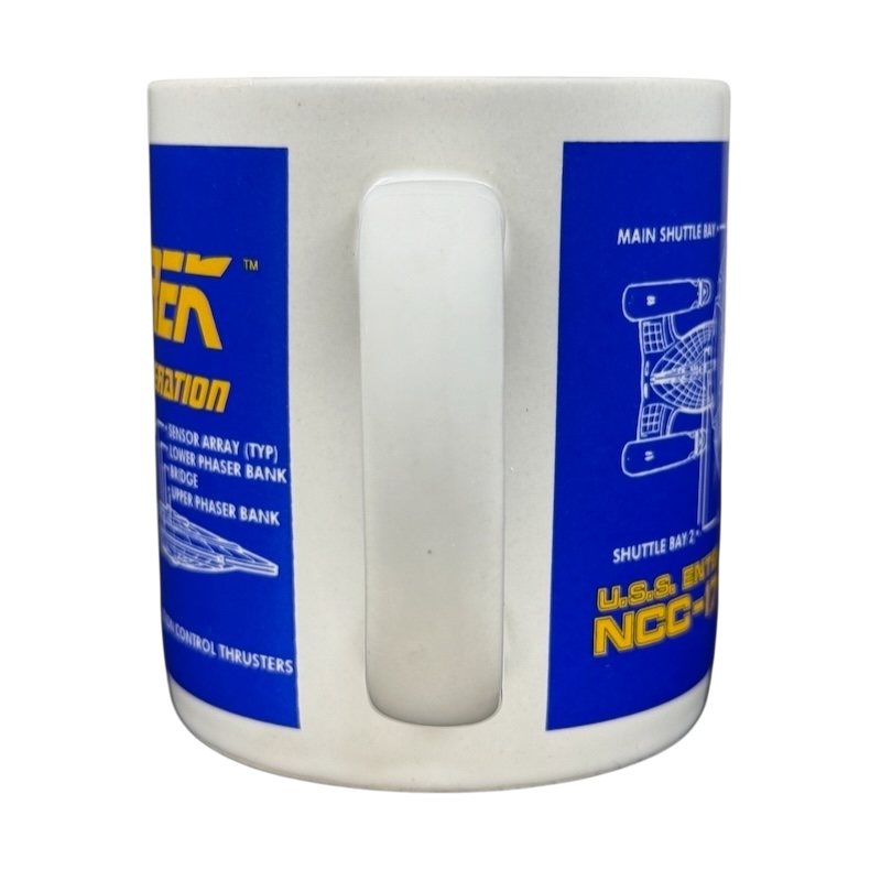 Side view of a Pfaltzgraff Star Trek The Next Generation U.S.S. Enterprise vintage mug featuring detailed graphics