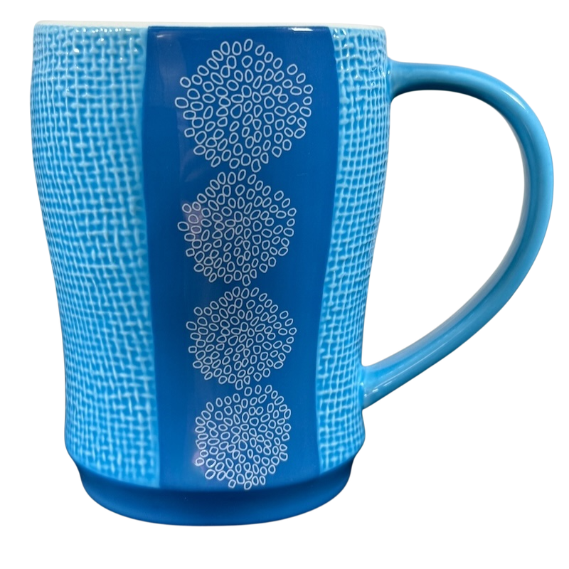 Starbuck svintage woven texture coffee mug in blue with white circular patterns and large handle
