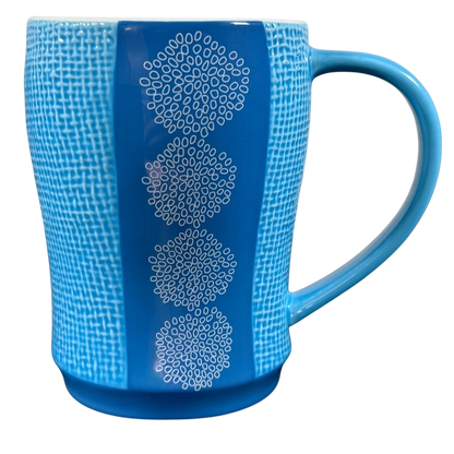 Starbuck svintage woven texture coffee mug in blue with white circular patterns and large handle