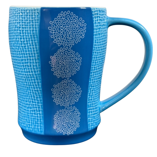 Starbuck svintage woven texture coffee mug in blue with white circular patterns and large handle