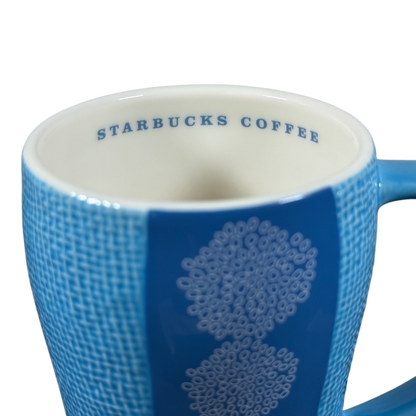 Starbuck svintage woven texture coffee mug by Starbucks in light blue with textured design and logo inside