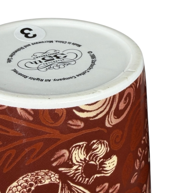 Bottom view of 2006 Starbucks 35th anniversary vintage Siren mug featuring intricate designs