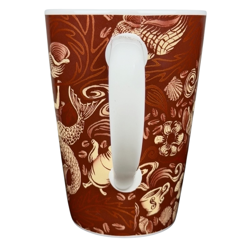 2006 Starbucks 35th anniversary vintage Siren mug with intricate design and decorative handle