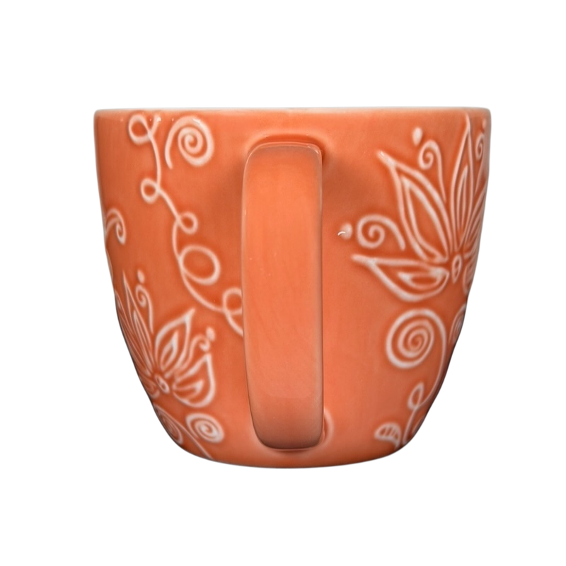 2006 Starbucks embossed coral flowers leaves mug with intricate floral design and curved handle