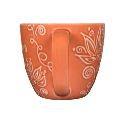 2006 Starbucks embossed coral flowers leaves mug with intricate floral design and curved handle