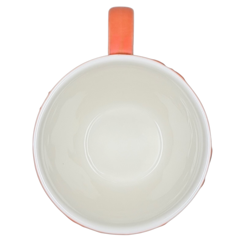 Top view of 2006 Starbucks embossed coral flowers leaves mug with a smooth inner surface