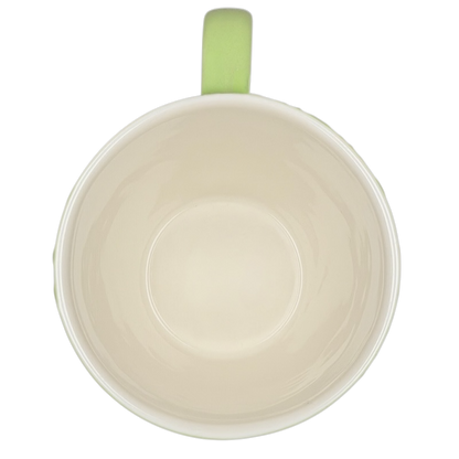 2006 Starbucks embossed green flowers hearts mug with a pastel green handle and smooth interior