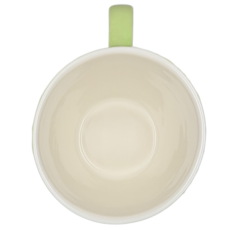 Inside view of the 2006 Starbucks embossed green flowers hearts mug showcasing its simple design